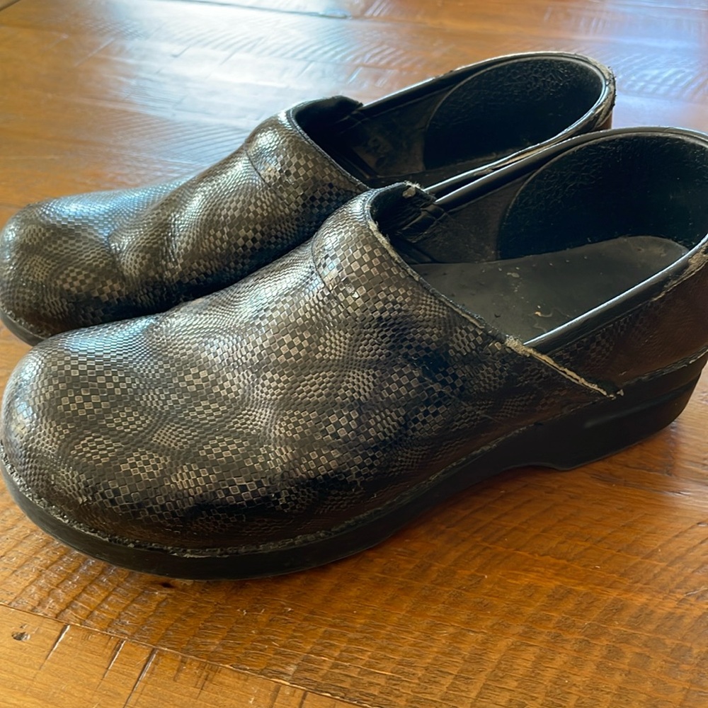 Black and silver Dansko Clogs